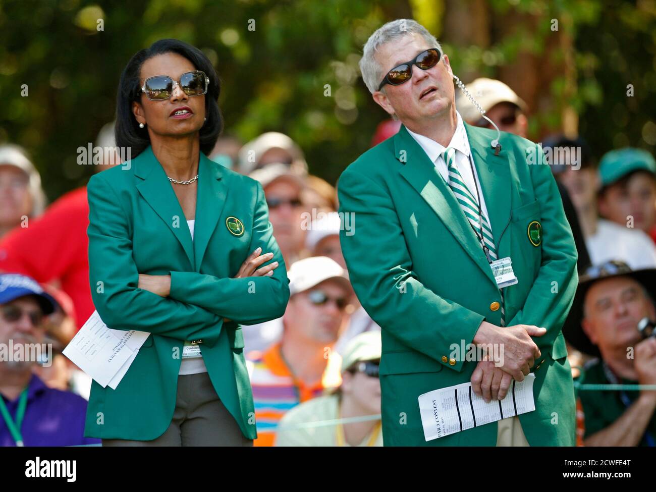 Former U.S. Secretary of State and new member of Augusta National Golf Club,  Condoleezza Rice looks on with member Bruce A. Lilly of Minnesota during  the annual Masters Par 3 Contest in
