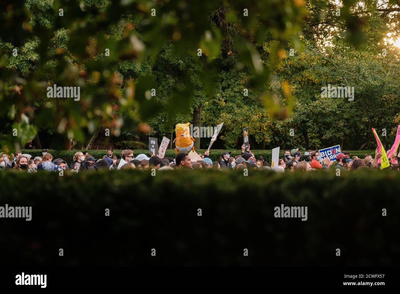 Cleveland, Ohio, USA. 29th Sep, 2020. People are seen protesting on the back lawn off the Cleveland Museum of Art during the first Presidential Debate held in Cleveland, Wednesday, September 30, 2020. Credit: Andrew Dolph/ZUMA Wire/Alamy Live News Stock Photo