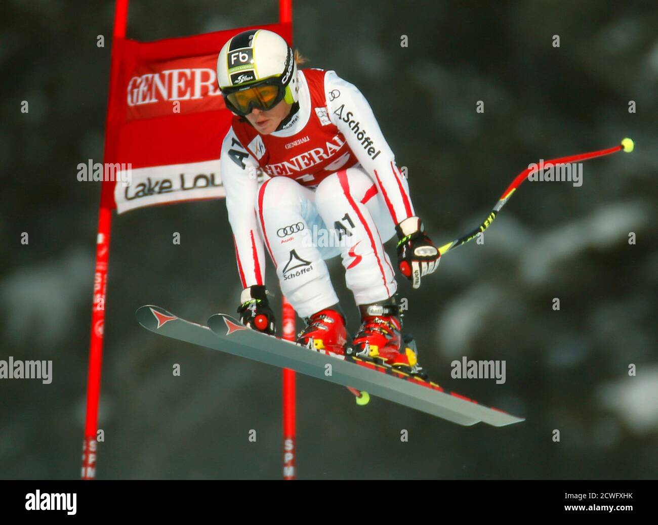 Nicole Schmidhofer of Austria takes air during alpine skiing training for the Women's World Cup Downhill in Lake Louise, Alberta, November 27, 2012.  REUTERS/Mike Blake  (CANADA - Tags: SPORT SKIING) Stock Photo
