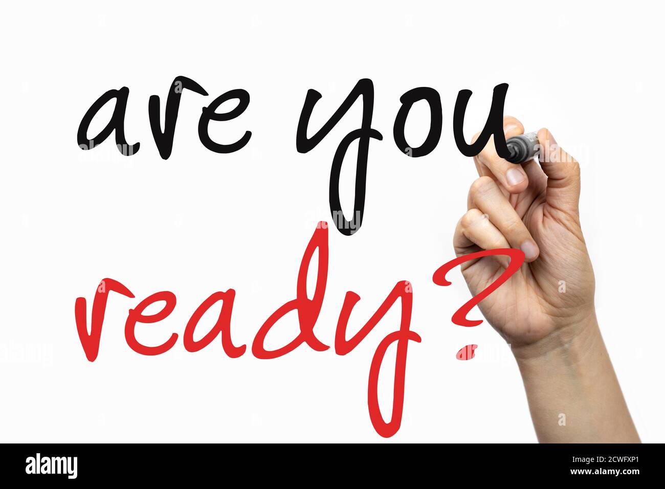 Are you ready phrase on a whiteboard, written with marker in a hand