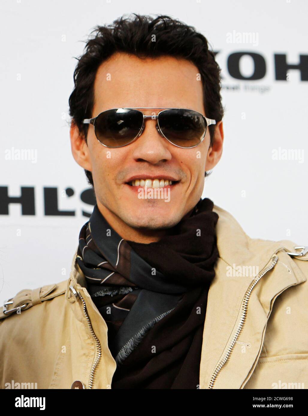 Marc Anthony poses at a news conference to announce 'The Jennifer Lopez and Marc Anthony' collections in partnership with Kohl's department stores at The London West Hollywood hotel in West Hollywood, California, November 18, 2010. Kohl's will be the exclusive provider of the contemporary lifestyle brands in the U.S. and it will be available nationwide in Fall 2011 beginning with women's and men's apparel and accessories. REUTERS/Danny Moloshok (UNITED STATES - Tags: ENTERTAINMENT FASHION BUSINESS HEADSHOT) Stock Photo