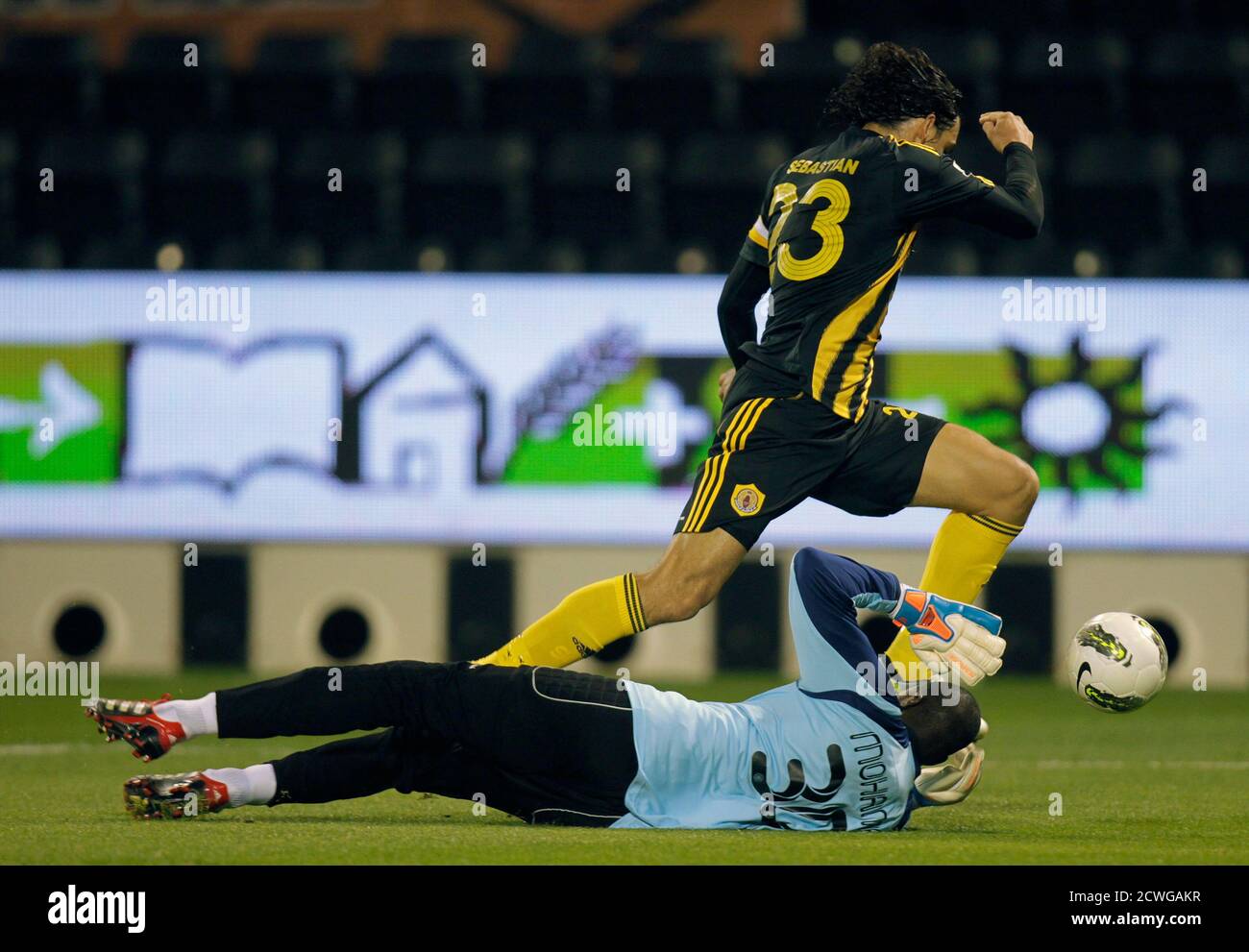 Qatar Sc S Sebastian Soria Top Scores The First Goal For His Team Next To Al Sadd S Goalkeeper Mohammed Saqer During Their Qatar Stars League Soccer Match In Doha March 17 12 Reuters Fadi Al Assaad Qatar Sc S Sebastian Soria Top Scores The First Goal For His Team Next To Al Sadd S Goalkeeper Mohammed Saqer During Their Qatar Stars League Soccer Match In Doha March 17 12 Reuters Fadi Al Assaad