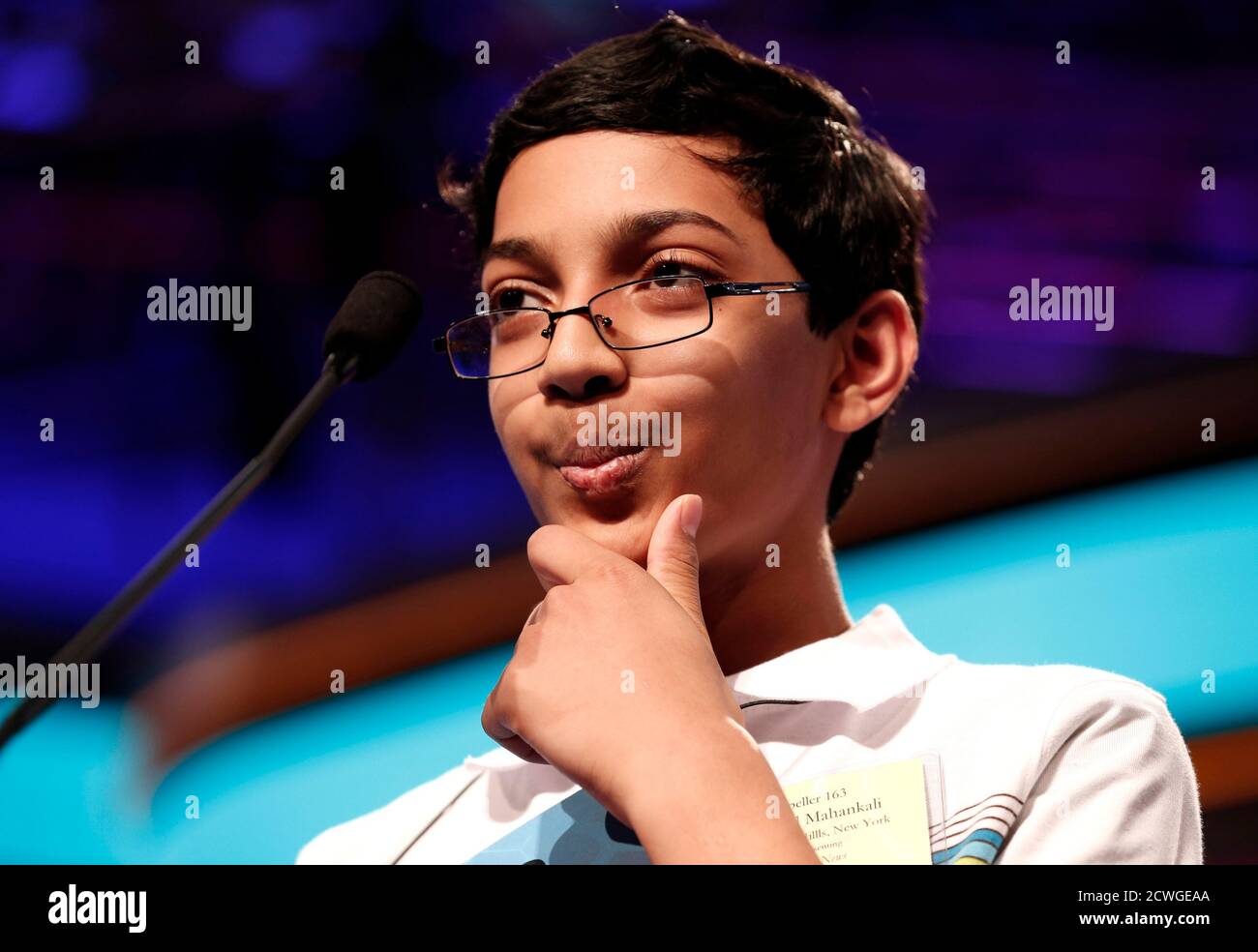 Arvind Mahankali of New York ponders a word on his way to winning the  National Spelling Bee at National Harbor in Maryland May 30, 2013.  Mahankali, a 13-year-old from Bayside Hills, New