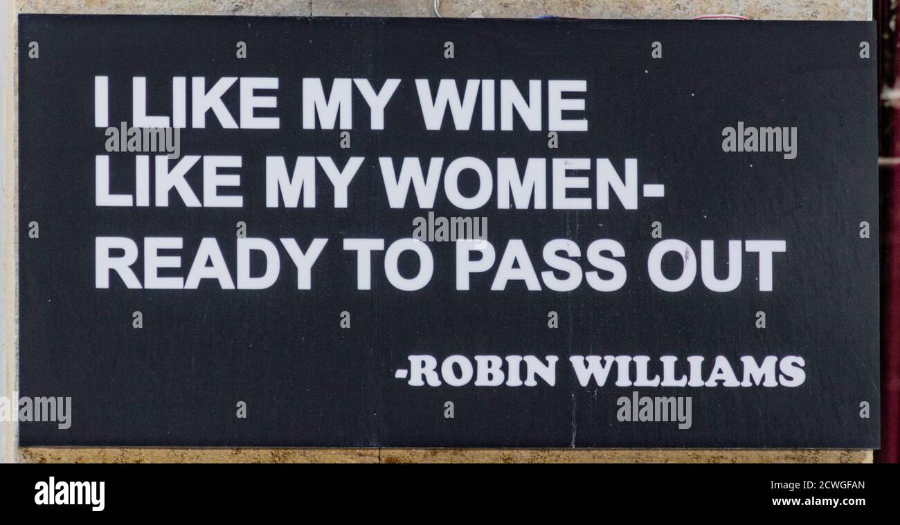 Tblisi, Georgia - June 8, 2017 - Sign says I like my wine like my women, ready to pass out Stock Photo