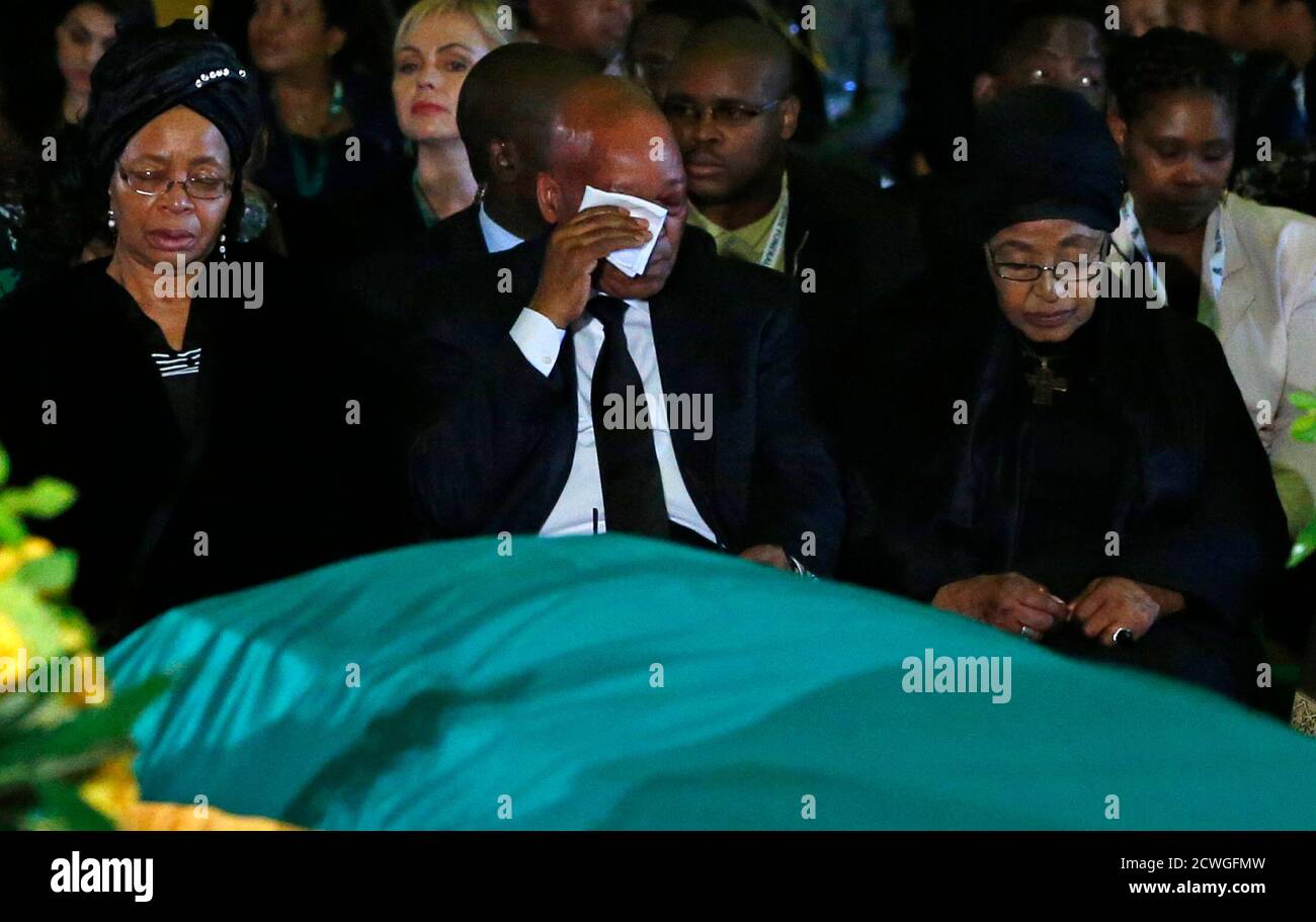 South African President Jacob Zuma C Wipes His Eyes While Sitting Beside Mandela S Widow Graca Machel L And Mandela S Ex Wife Winnie Mandela During A Send Off Ceremony For Late Former South African President Dressy casual, also known as casual chic, is an invitation to wear that cute weekend look that you love. alamy