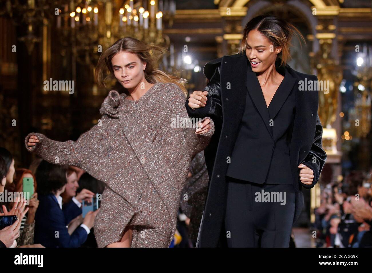 Models Cara Delevingne L And Joan Smalls R Present Creations By British Designer Stella Mccartney As Part Of Her Fall Winter 14 15 Women S Ready To Wear Collection Show During Paris Fashion Week March 3 14 Models Cara Delevingne L And Joan Smalls R Present Creations By British Designer Stella Mccartney As Part Of Her Fall Winter 14 15 Women S Ready To Wear Collection Show During Paris Fashion Week March 3 14