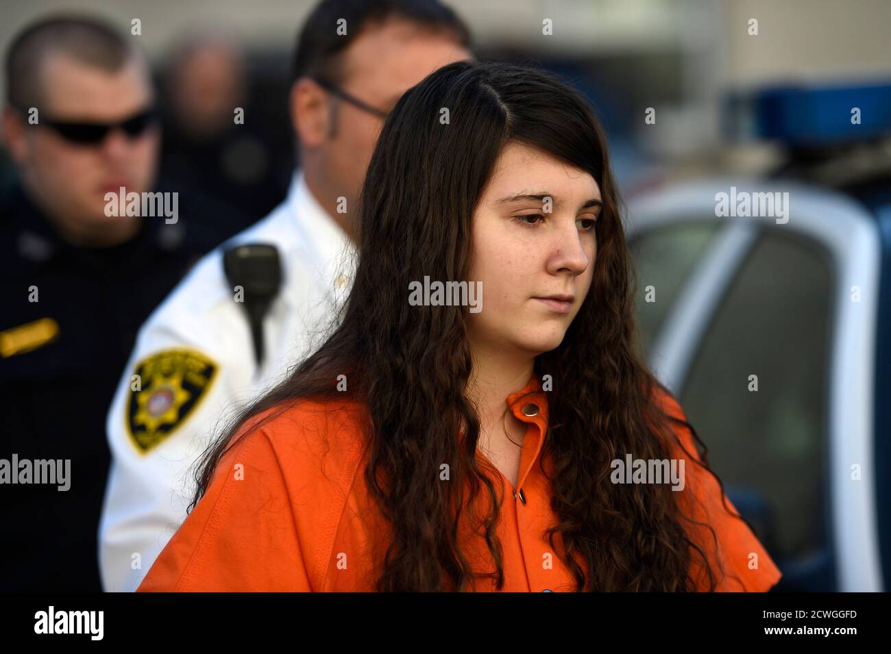 Miranda Barbour, 19, the woman dubbed the so-called Craigslist killer  suspect, is led into court by sheriff deputies in Sunbury, Pennsylvania  April 1, 2014. Barbour and her husband, Elytte Barbour, 22, have