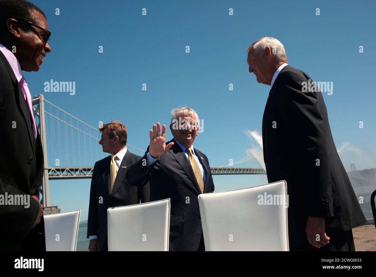 NBA Commissioner David Stern (C) gestures as he is joined by Golden State Warriors executives, including team advisor Jerry West (R), in announcing the team's plans of building a new waterfront sports and entertainment arena on Piers 30-32 in San Francisco, California May 22, 2012. The Warriors, now located in Oakland, plans to move into the privately financed facility in time for the 2017-18 season. REUTERS/Robert Galbraith  (UNITED STATES - Tags: SPORT BASKETBALL) Stock Photo