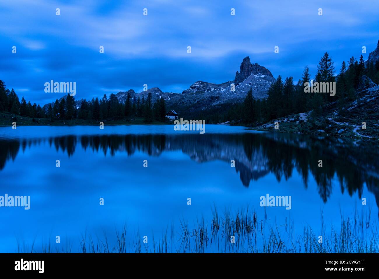 Blue lights of dusk over Lake Federa and Becco di Mezzodi, Ampezzo Dolomites, Belluno province, Veneto, Italy Stock Photo