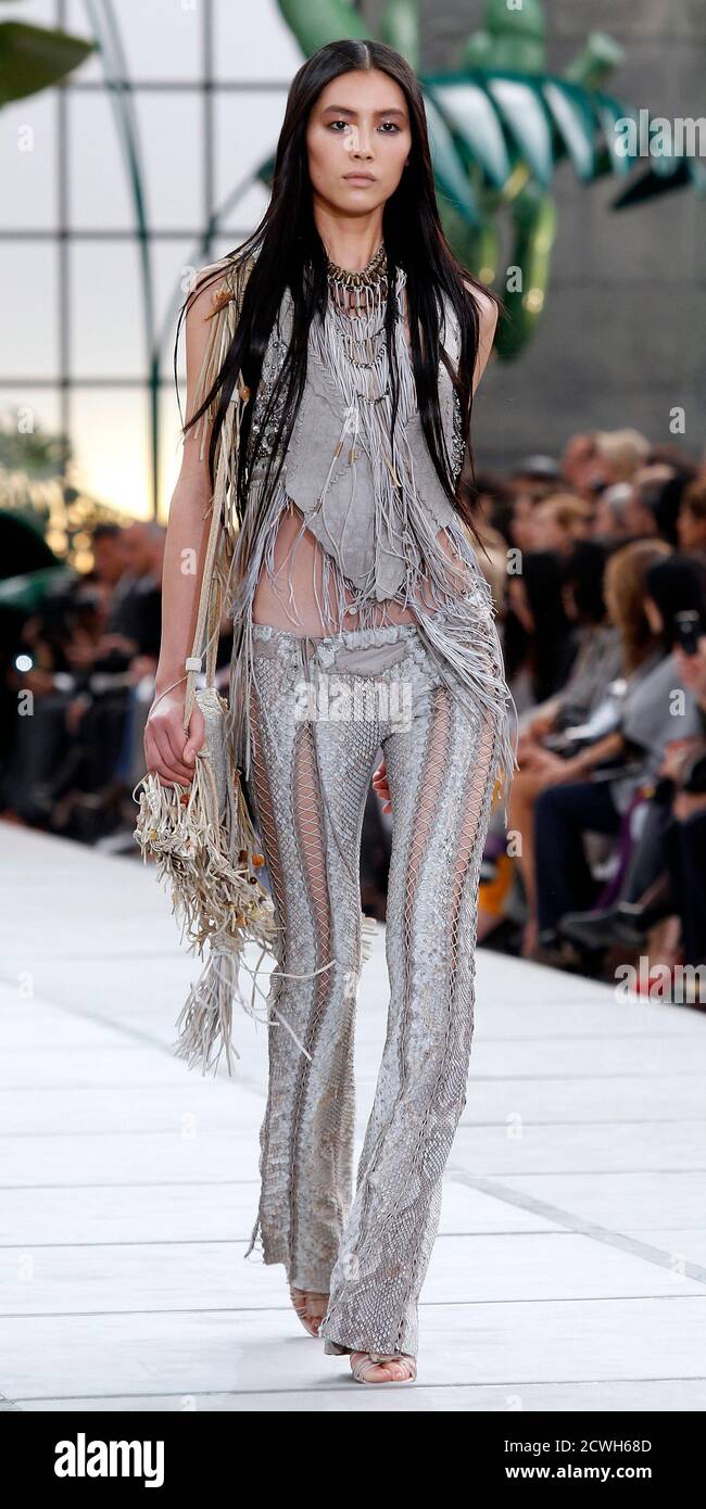 A model presents a creation as part of the Roberto Cavalli Spring/Summer  2011 women's collection during Milan Fashion Week September 27, 2010.  REUTERS/Alessandro Garofalo (ITALY - Tags: FASHION Stock Photo - Alamy