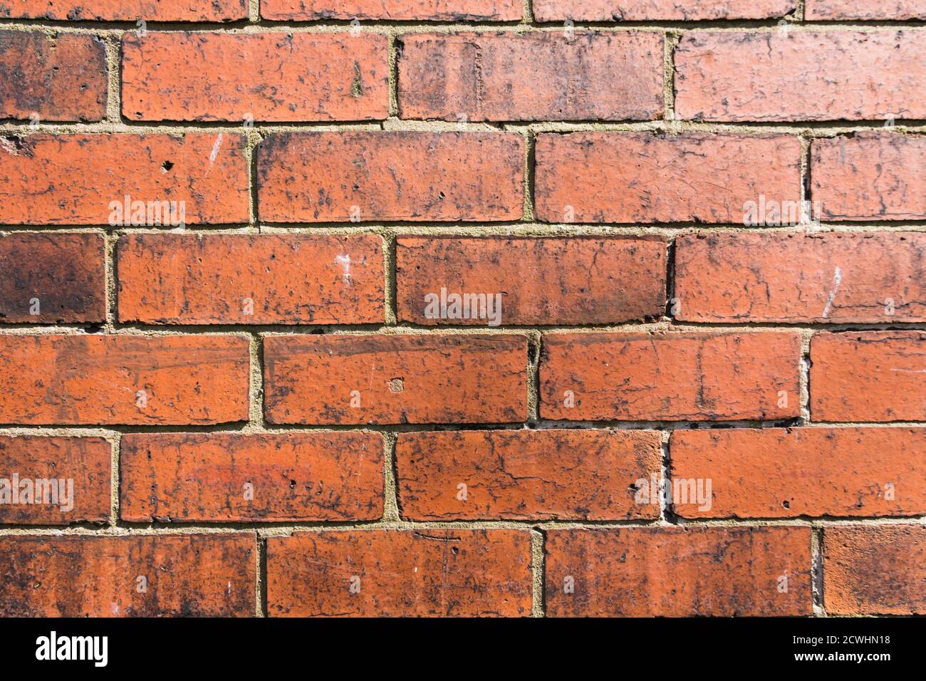 Red brick house wall full frame. Exterior wall of an early 1930s council built semi-detached house in Bolton. Stock Photo
