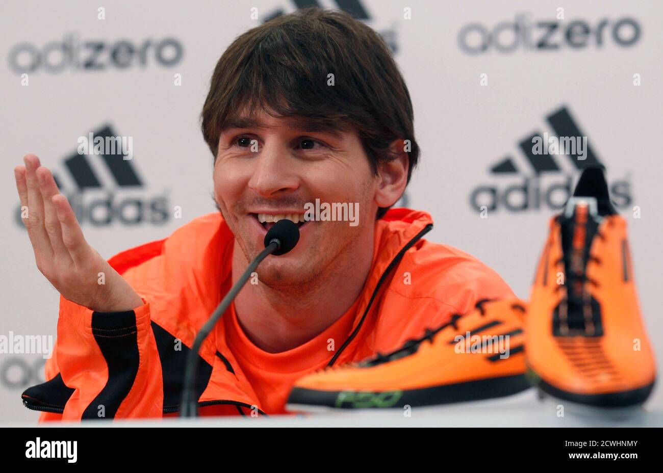 Barcelona's soccer player Lionel Messi of Argentina speaks as he presents  his Adidas adiZero F50 shoes