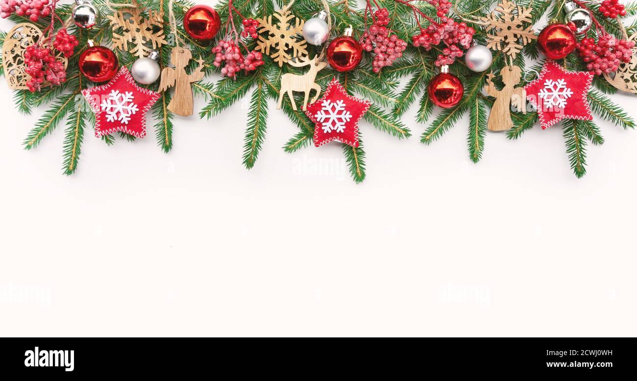 Horizontal banner for Christmas design. Christmas tree garland with  traditional decorations. Mockup with New Year banner made of branches of a  Christm Stock Photo - Alamy