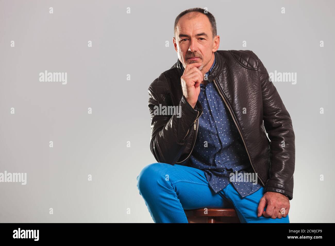 Old man in leather jacket hi-res stock photography and images - Alamy