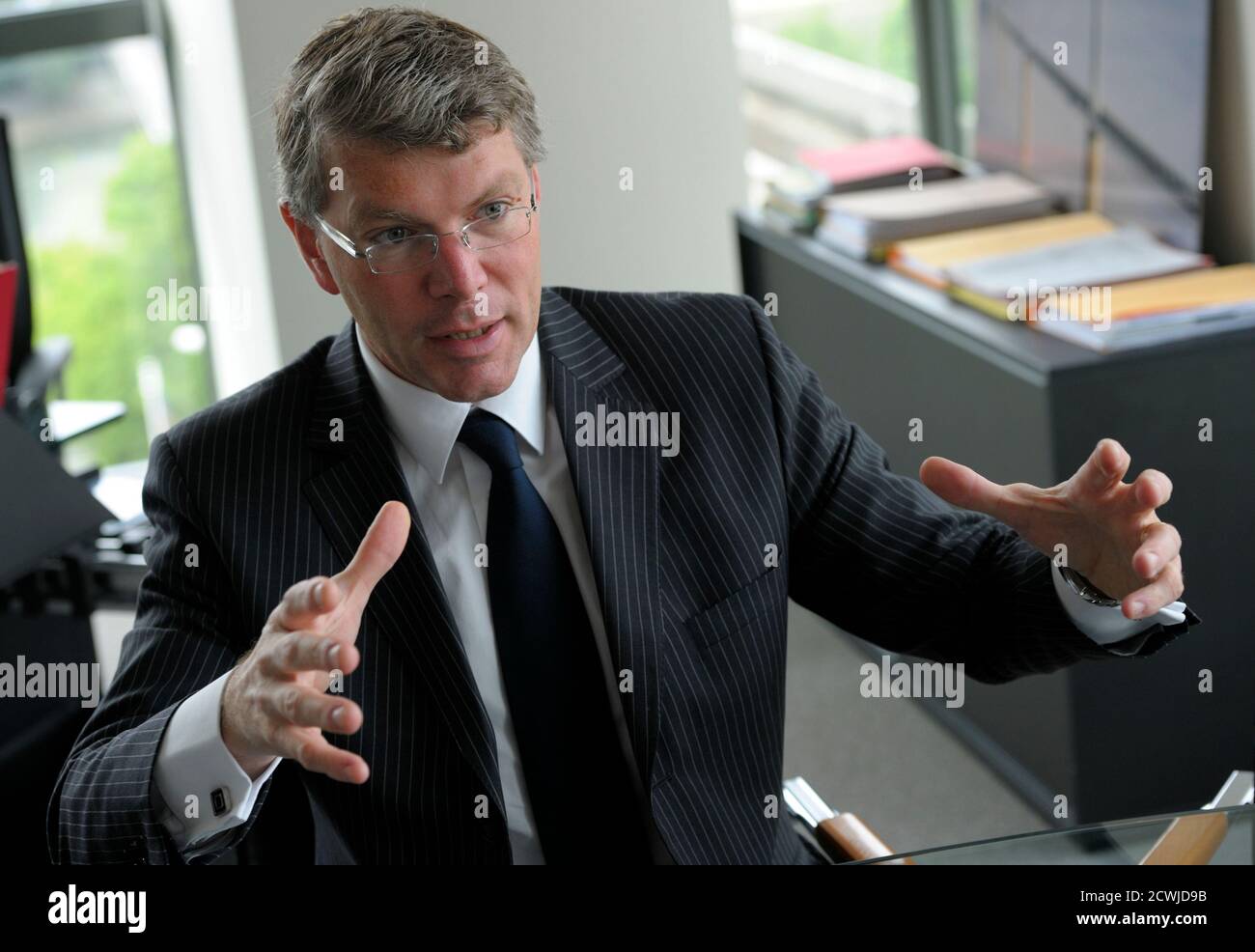 Pierre Berger, Chief Executive Officer of the French construction group Eiffage, speaks to Reuters during an interview at the company's headquarters in Asnieres, near Paris, June 5, 2012.   REUTERS/Philippe Wojazer   (FRANCE - Tags: BUSINESS CONSTRUCTION) Stock Photo