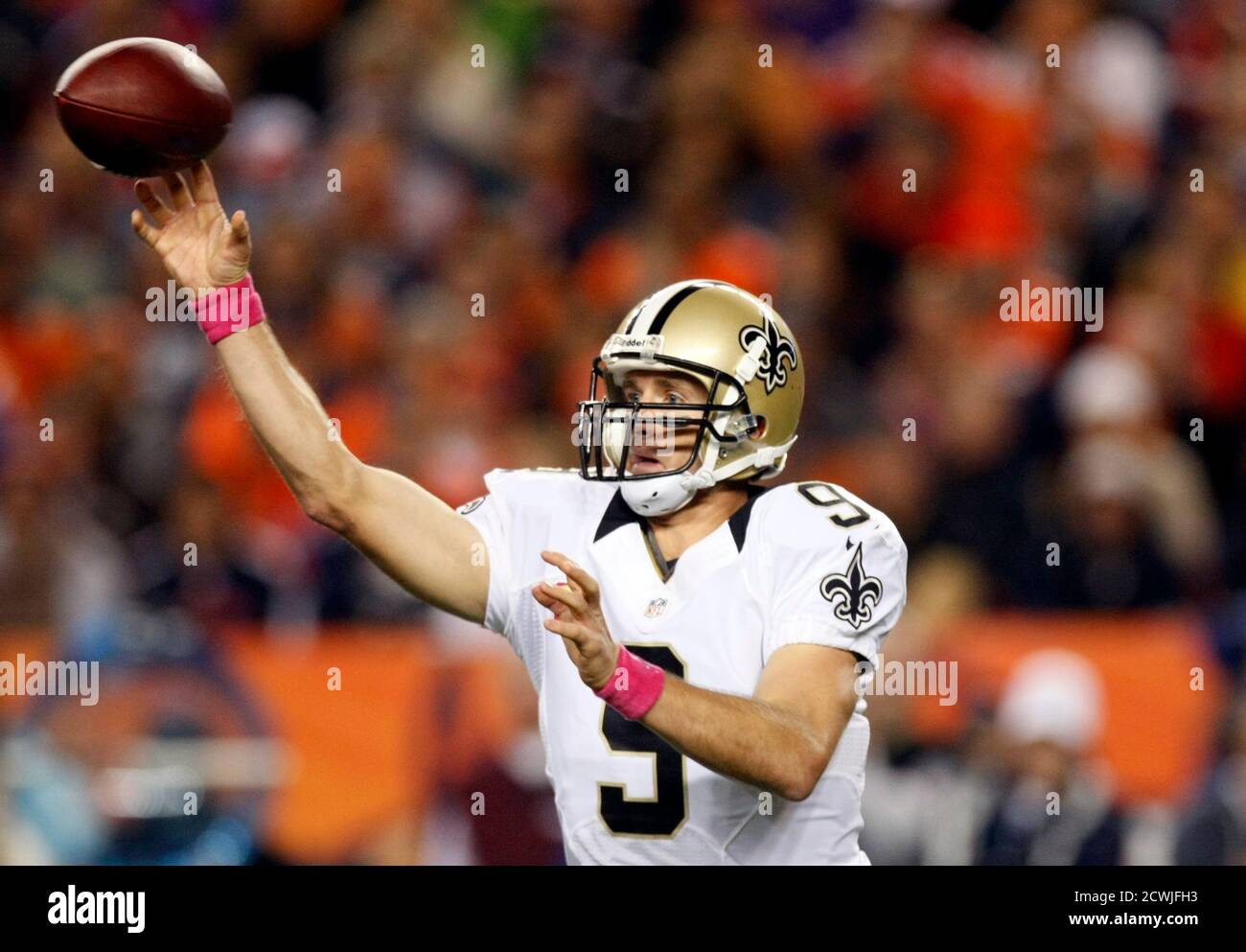 New Orleans Saints quarterback Drew Brees throws against the Denver Broncos in the first quarter of their NFL football game in Denver October 28, 2012.  REUTERS/Rick Wilking (UNITED STATES - Tags: SPORT FOOTBALL) Stock Photo