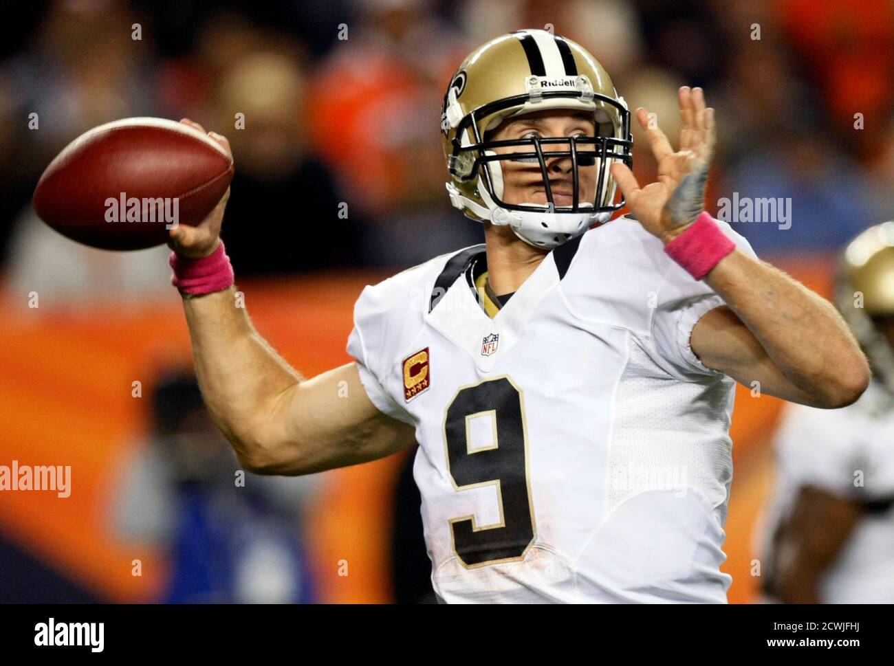 New Orleans Saints quarterback Drew Brees throws against the Denver Broncos in the second quarter in their NFL football game in Denver October 28, 2012.  REUTERS/Rick Wilking (UNITED STATES - Tags: SPORT FOOTBALL) Stock Photo