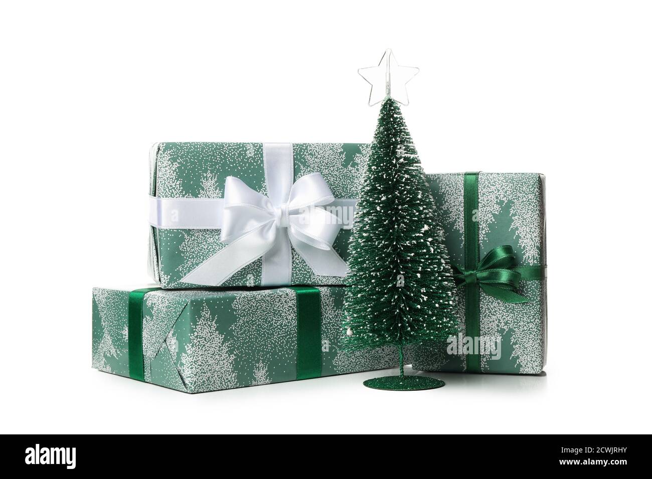Gift boxes and Christmas tree isolated on white background Stock Photo ...