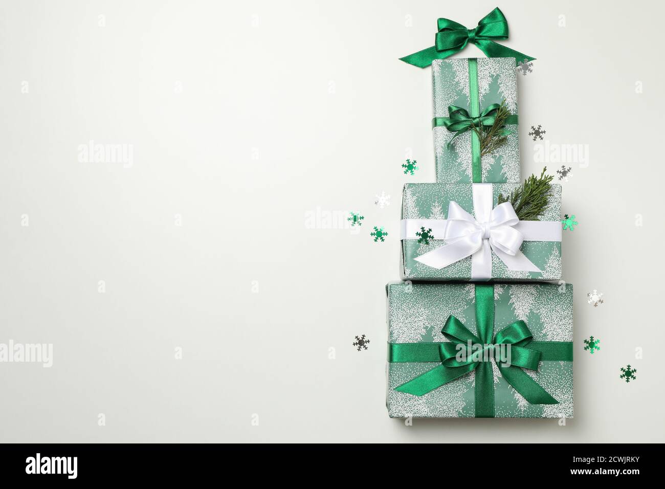 Christmas tree made of gift boxes on white background Stock Photo