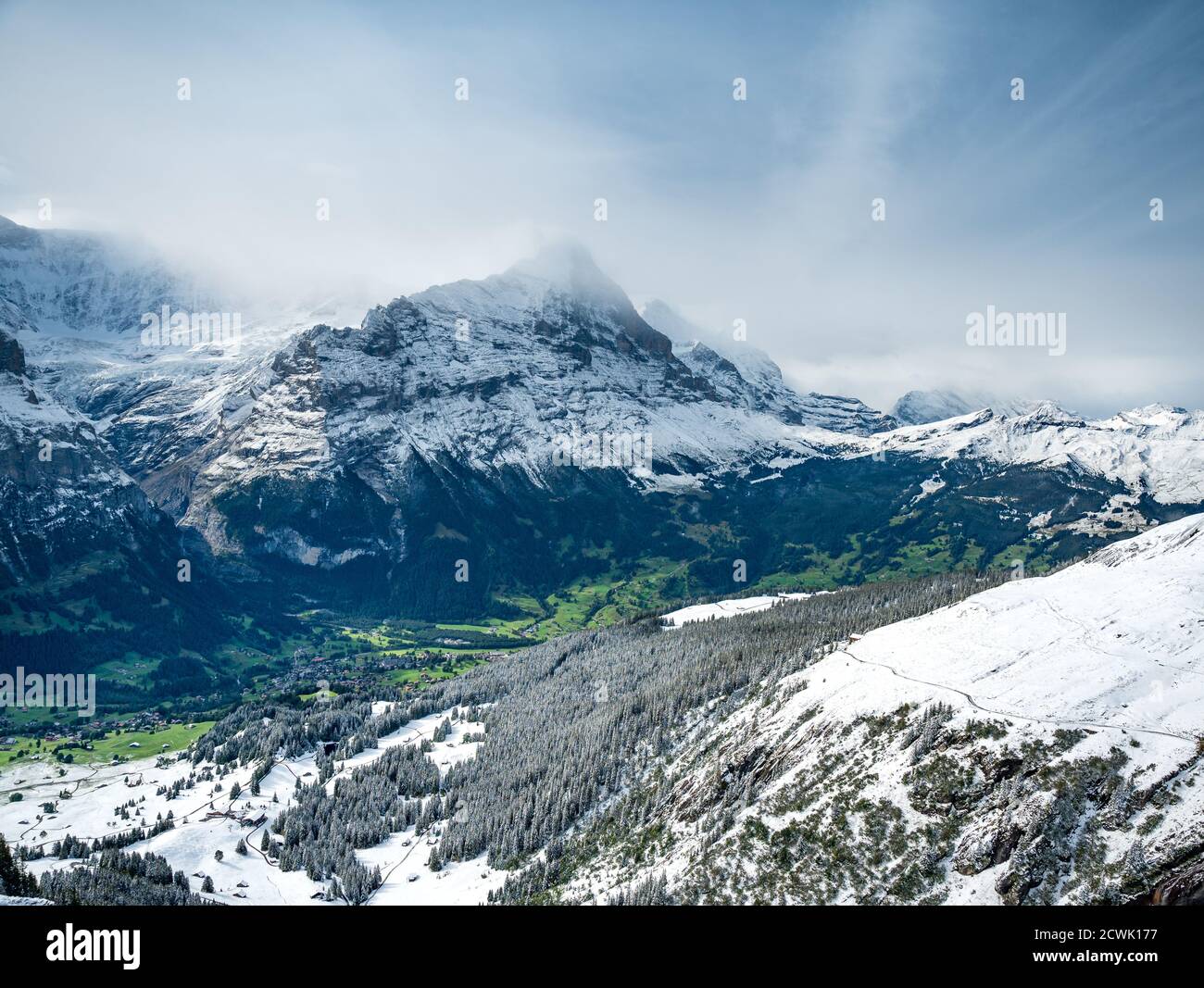 view over Grindelwald with Eiger Northface in first snow Stock Photo Alamy
