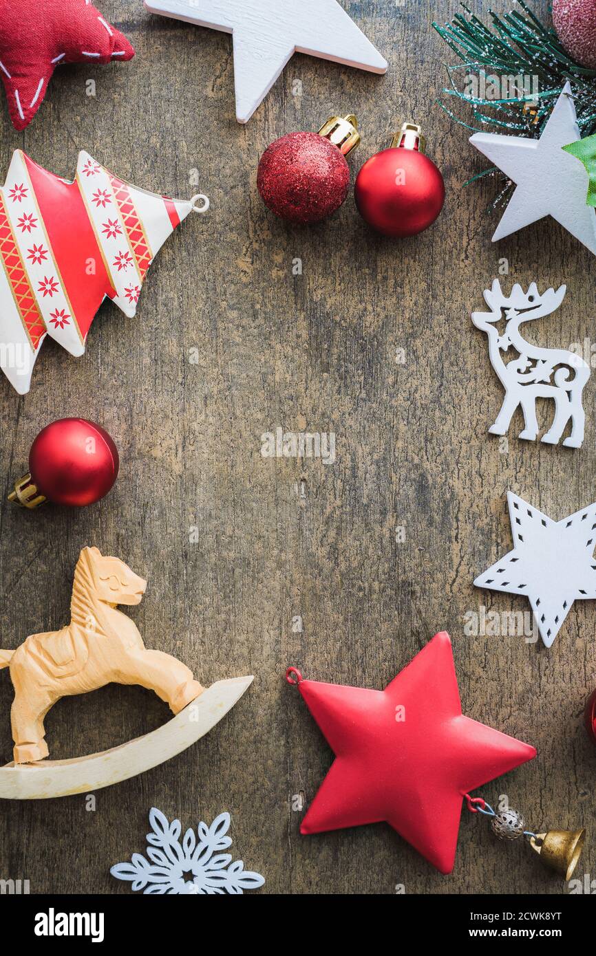 Set of red and white christmas decoration items arranged in circle with copy space for text. Greeting card cover Stock Photo