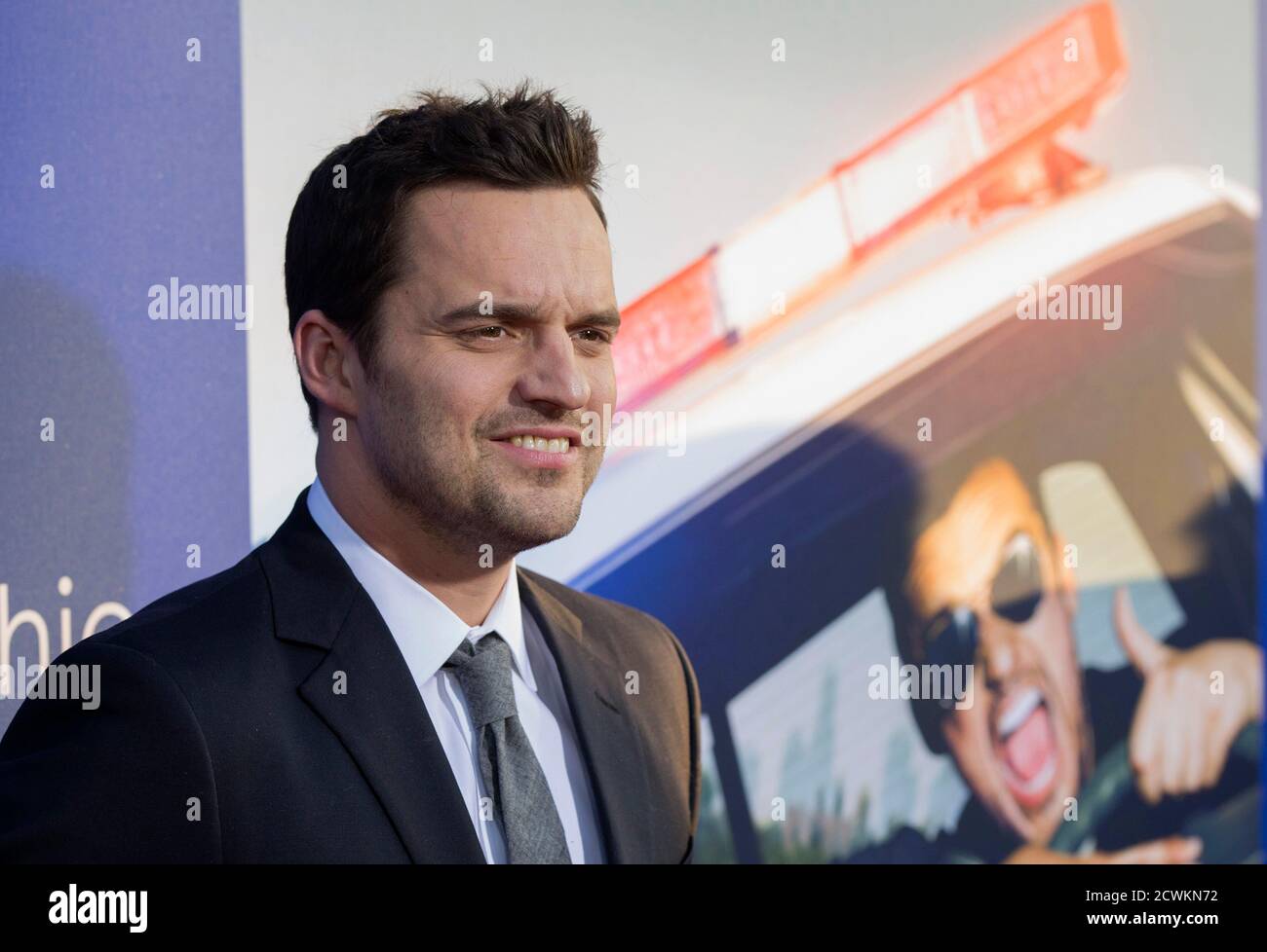 Cast member Jake Johnson poses at the premiere of "Let\