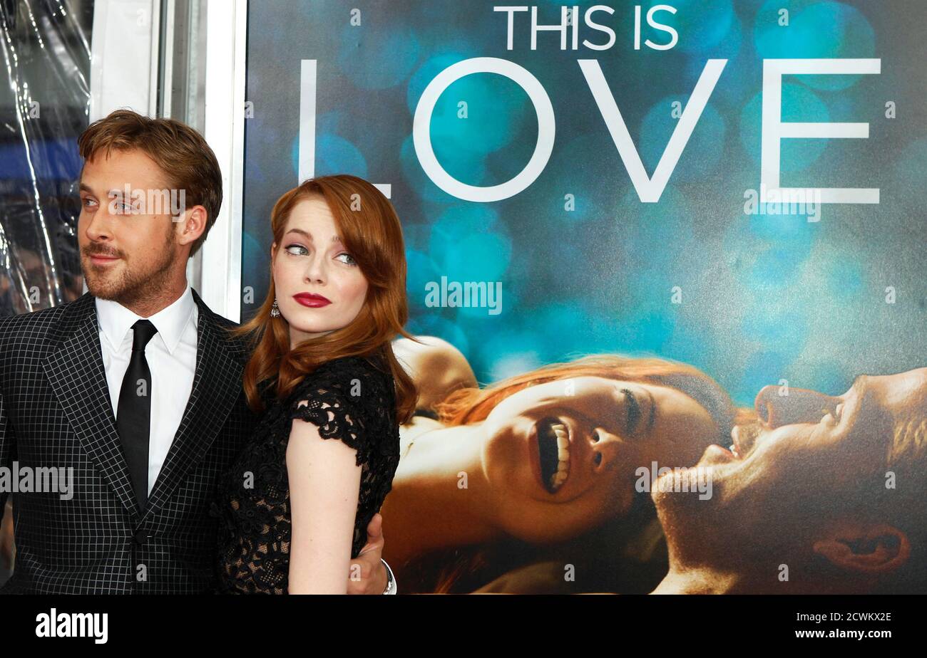 Cast members Ryan Gosling (L) and Emma Stone arrive for the premiere of  their film 'Crazy,