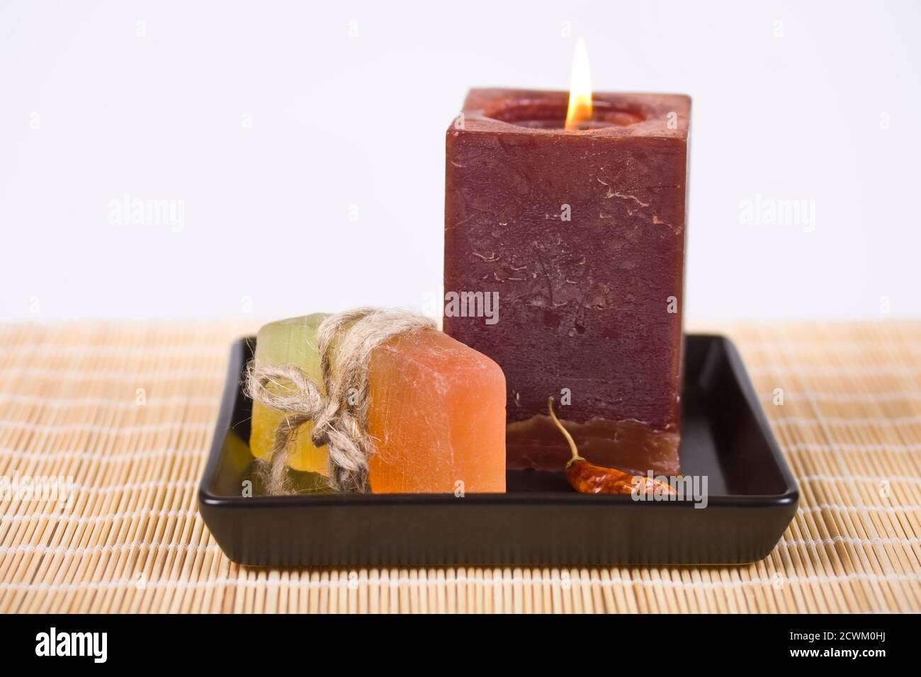 Soap and candle on a white background Stock Photo Alamy