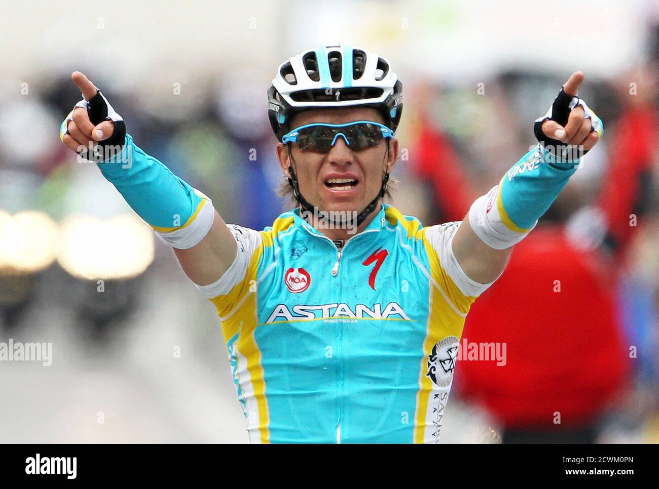 Astana Pro Team rider Maxim Iglinskiy of Kazakhstan celebrates on the  podium after winning the Liege-Bastogne-Liege Classic cycling race in Ans  near in Liege April 22, 2012. Iglinskiy of Kazakhstan won the