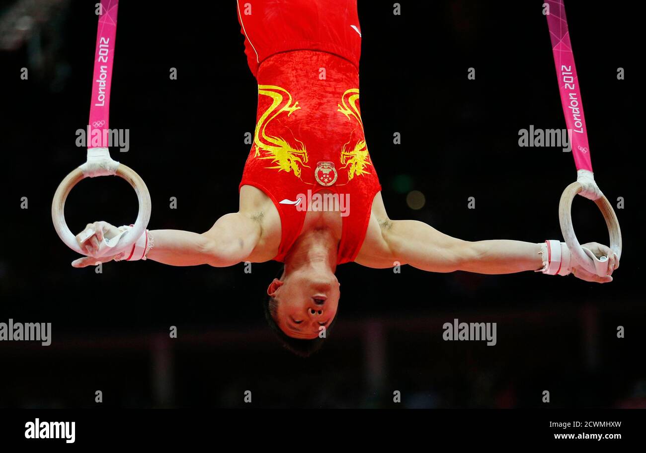 China's Chen Yibing competes in the men's gymnastics rings final in the  North Greenwich Arena during the London 2012 Olympic Games August 6, 2012.  REUTERS/Brian Snyder (BRITAIN - Tags: SPORT GYMNASTICS OLYMPICS