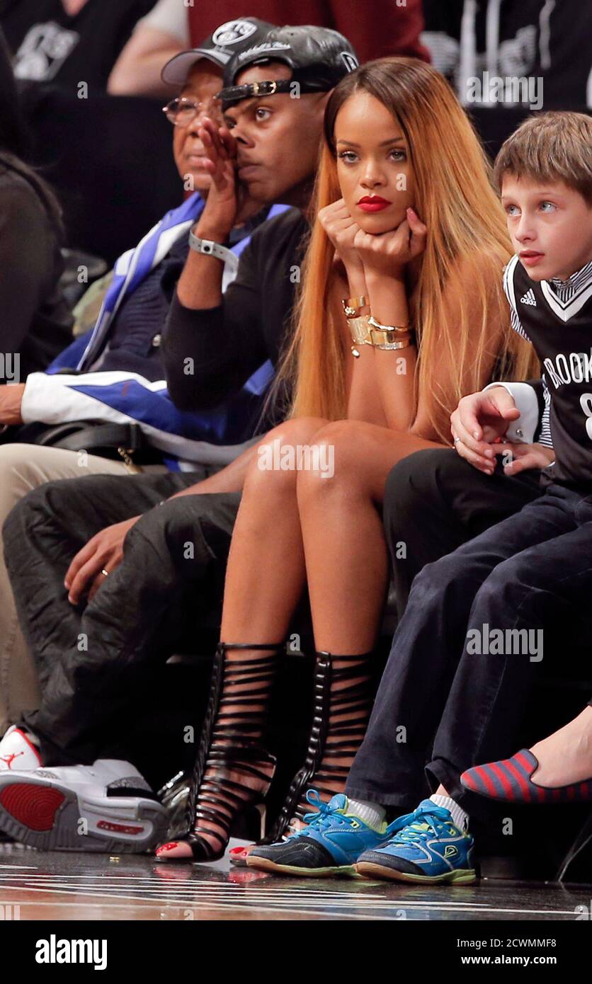 Singer Rihanna watches the Brooklyn Nets play the Chicago Bulls in the  fourth quarter of Game 7 of their NBA Eastern Conference Quarterfinals  basketball playoff series in New York, May 4, 2013.