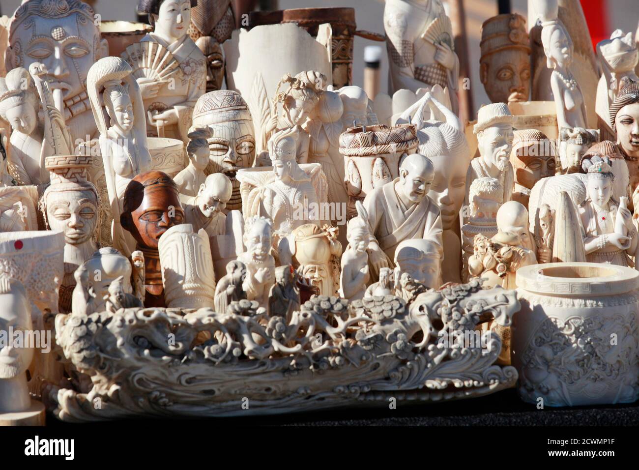 Dozens of confiscated carved ivory sculptures are displayed before 6 tons of ivory was crushed in Denver, Colorado November 14, 2013.  The U.S. Fish and Wildlife Service organized the crushing. REUTERS/Rick Wilking (UNITED STATES - Tags: CRIME LAW ANIMALS) Stock Photo