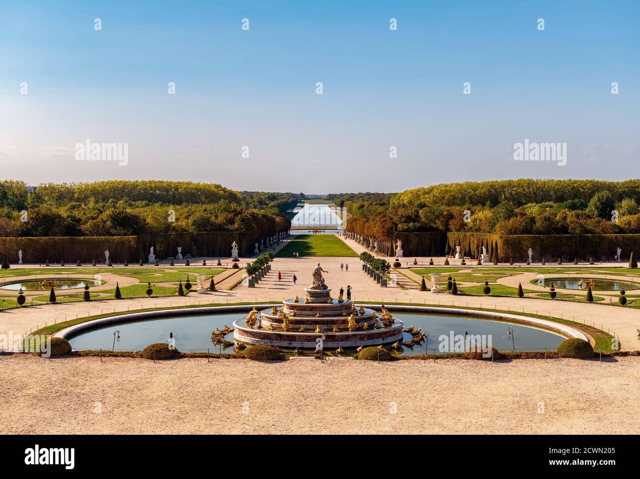 Latona Fountain and Grande Perspective at golden hour in Versailles Gardens Stock Photo