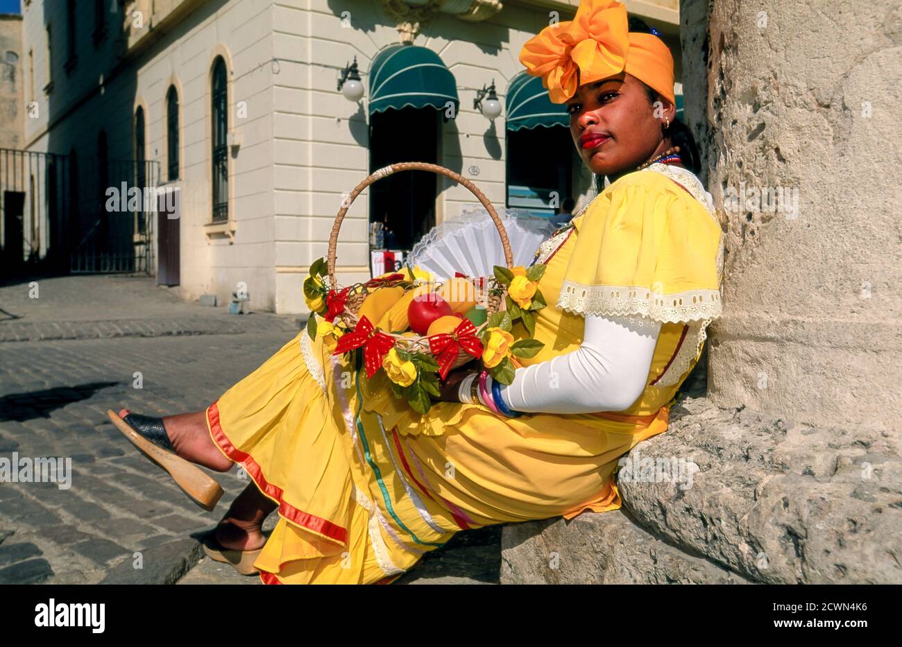 Cuban female tour guide, Cathedral Square, Havana, Cuba Stock Photo