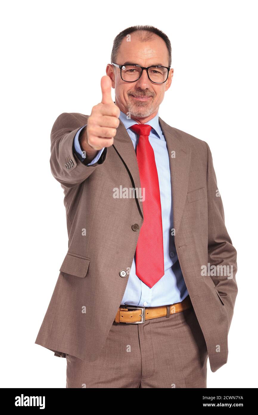smiling old businessman making the ok thumbs up hand sign on white ...