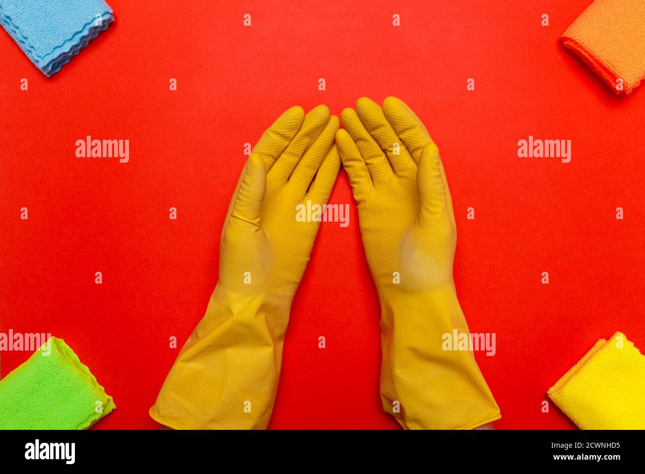 Hand in yellow gloves scrubbing hi-res stock photography and images - Alamy