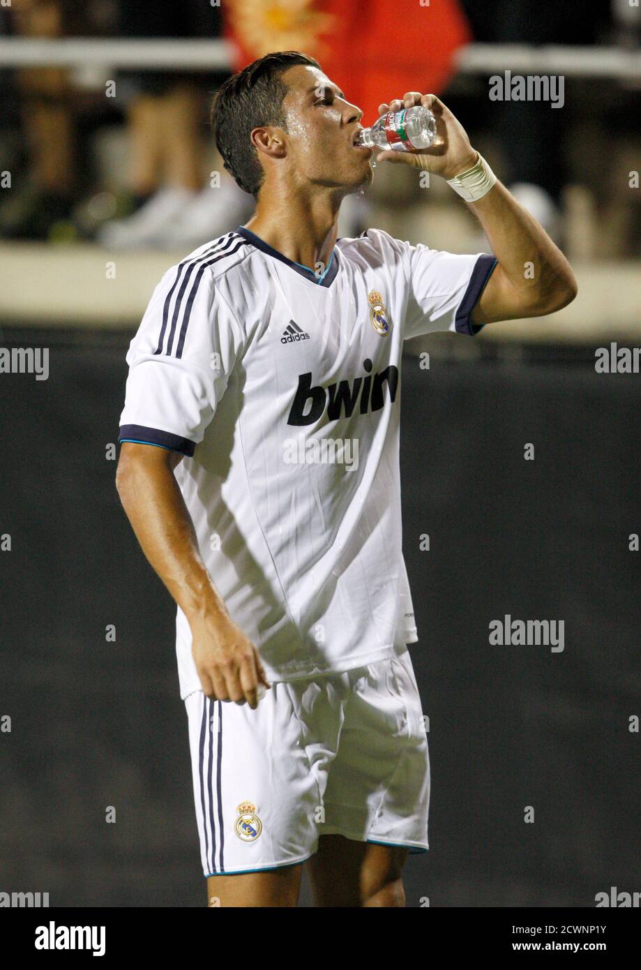 Real Madrid's Cristiano Ronaldo leaves the field after their 2012 Herbalife  World Football Challenge soccer match against Santos Laguna at Sam Boyd  Stadium in Las Vegas, Nevada August 5, 2012. REUTERS/Steve Marcus (