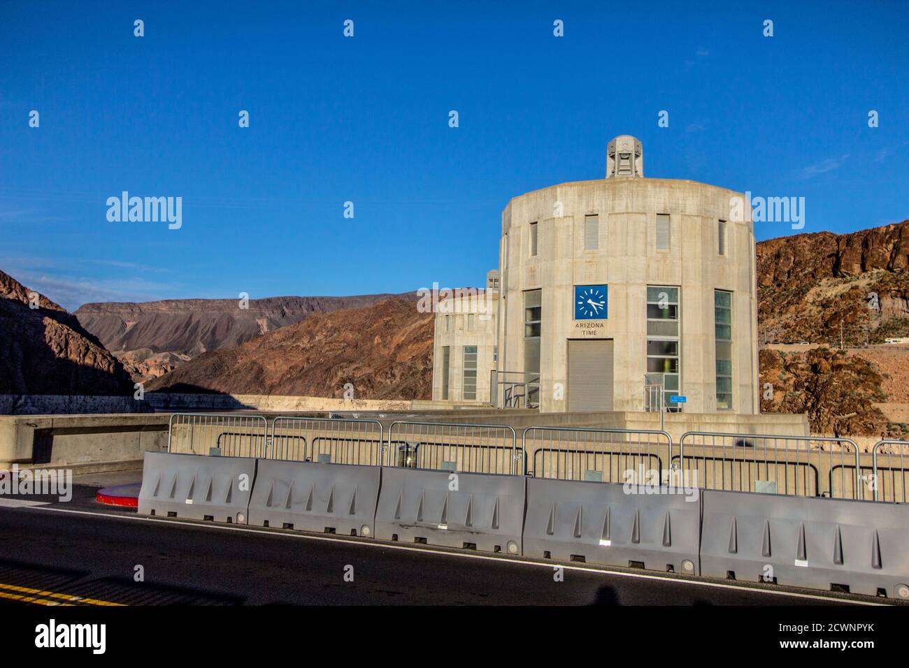Arizona Time. Large clock displays Arizona time at the Hoover Dam on the Nevada and Arizona state border. Stock Photo