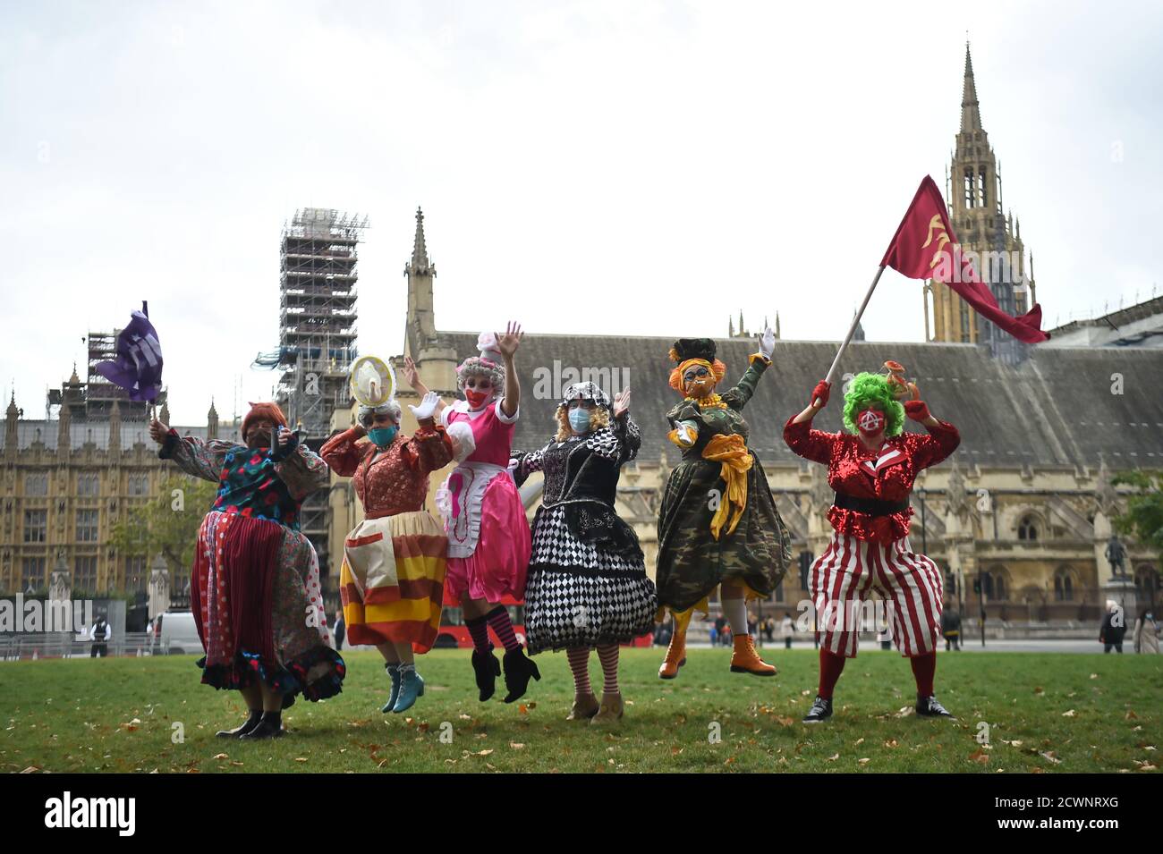 Pantomime dames in Parliament Square as they join other creative workers for a rally to highlight the impact of the pandemic on pantomime and live theatre. Stock Photo