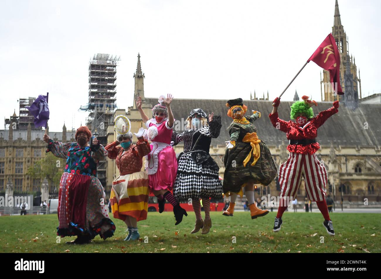 Pantomime dames in Parliament Square as they join other creative workers for a rally to highlight the impact of the pandemic on pantomime and live theatre. Stock Photo