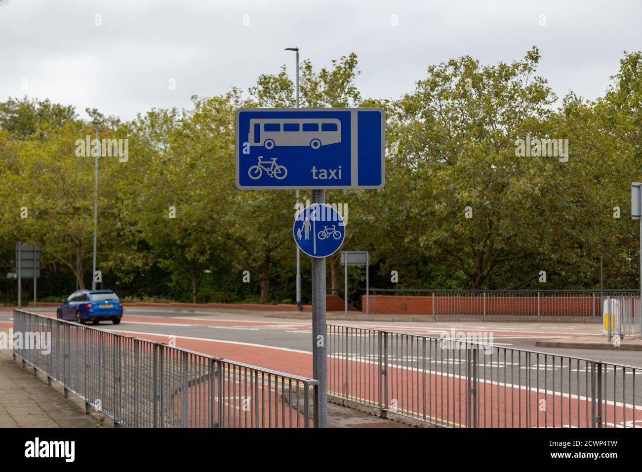 A road sign along side a bus and cycle lane Stock Photo