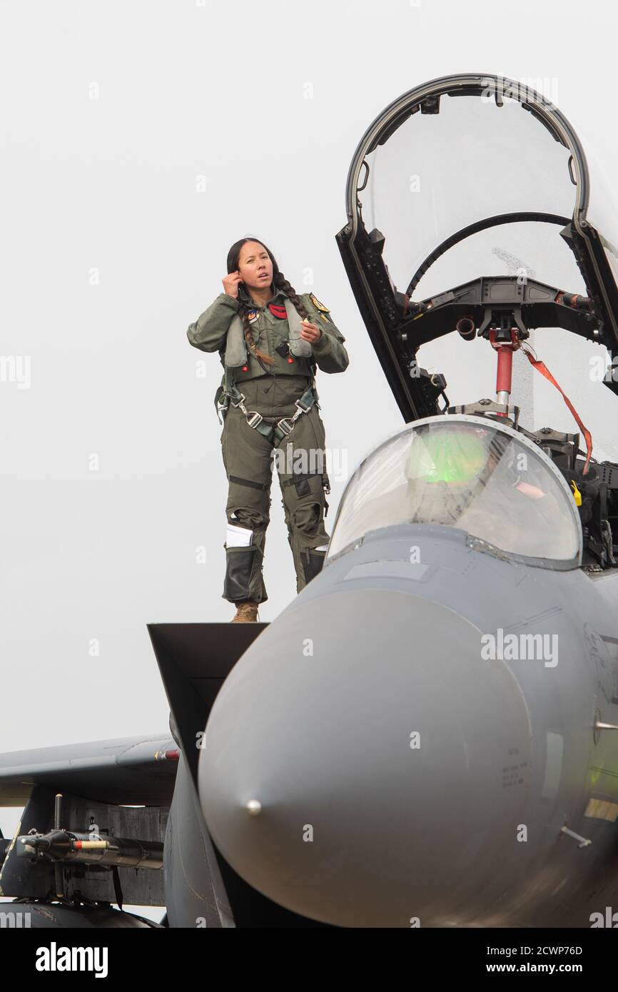 Weapon Systems Officer Captain Gianna-Rose Acosta of the United States Air  Force's (USAF) 48th Fighter Wing, stationed at RAF Lakenheath in Suffolk,  prepares for take off in an F-15E Strike Eagle at