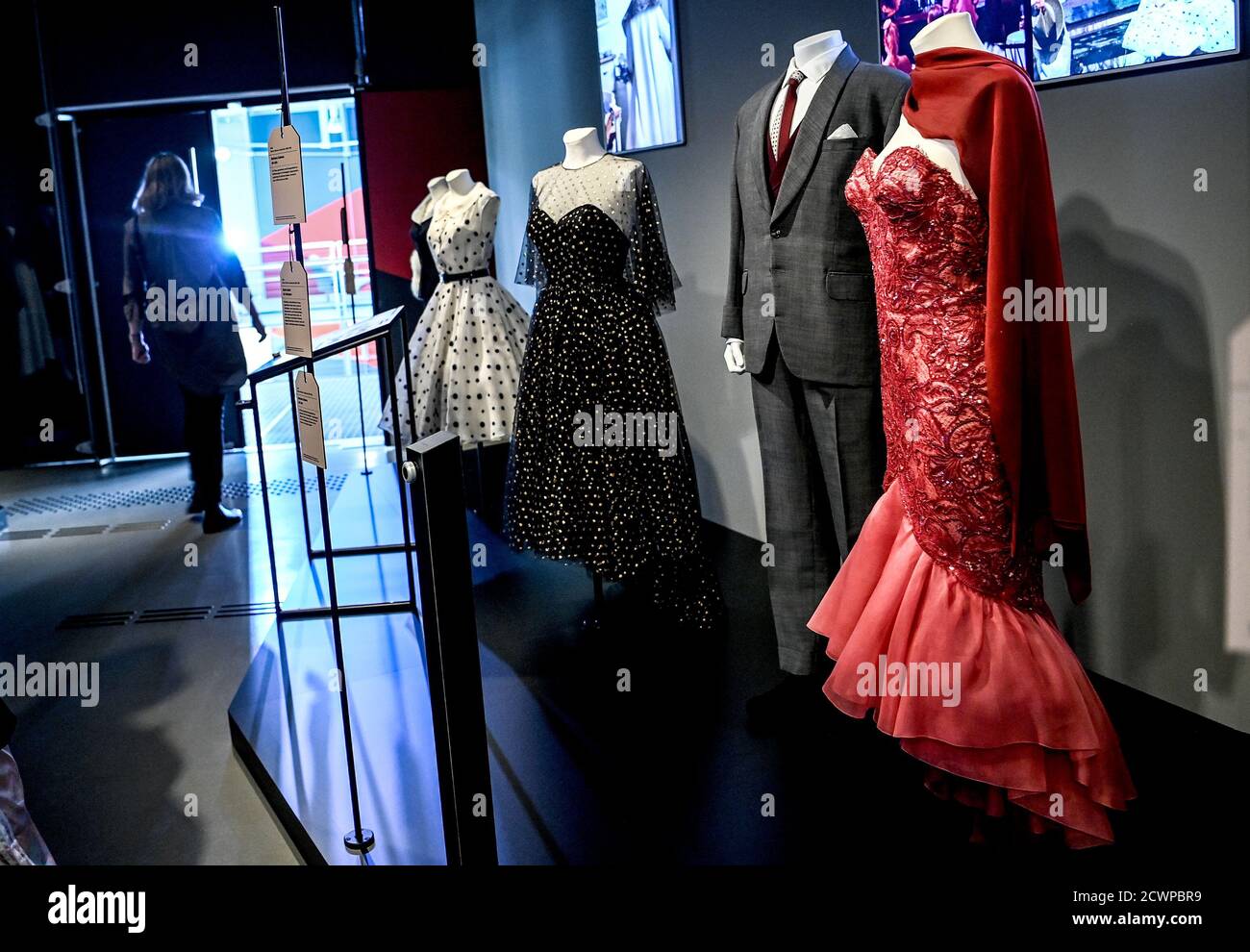 Berlin, Germany. 29th Sep, 2020. A visitor walks through the exhibition 'Hautnah. The Film Costumes of Barbara Baum' at the Deutsche Kinemathek - Museum für Film und Fernsehen. From 01.10. 2020 to 03.05.2021, more than 40 original film costumes from five decades of costume design will be shown. Credit: Britta Pedersen/dpa-Zentralbild/dpa - ATTENTION: Only for editorial use in connection with current reporting and only with full mention of the above credit/dpa/Alamy Live News Stock Photo
