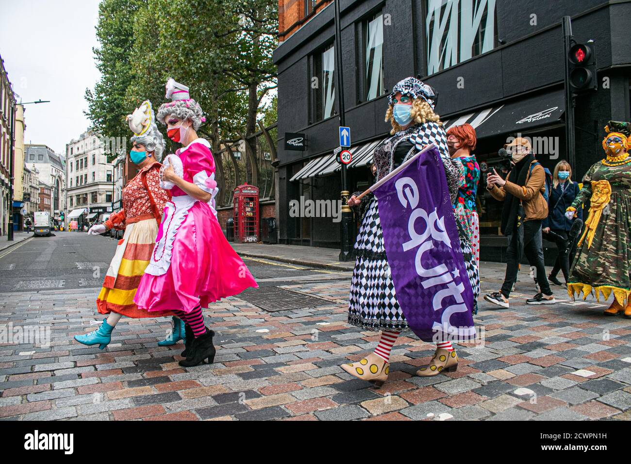 LONDON,UK 30 September 2020. Pantomime dames, creative workers march together in a protest organised by Equity and Bectu  to Parliament to highlight  the cancellation of the pantomime season this year due to coronavirus pandemic  and are  calling for an extension to the government's furlough scheme for theatre workers. Credit: amer ghazzal/Alamy Live News Stock Photo