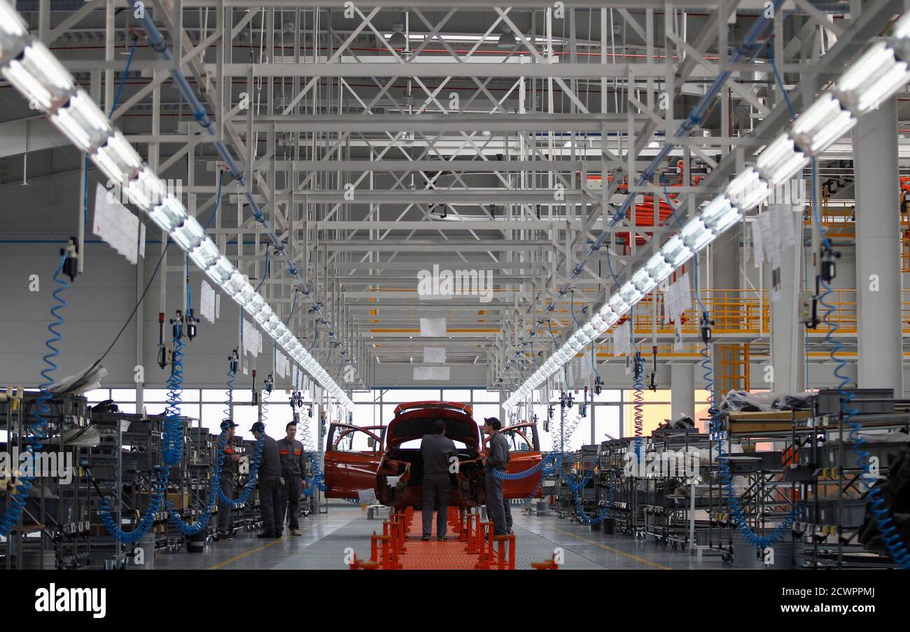 Mechanics work on an assembly line in the newly opened car factory of Great  Wall Motor Co near the town of Lovech, some 150 km (93 miles) north-east of  Sofia February 21,