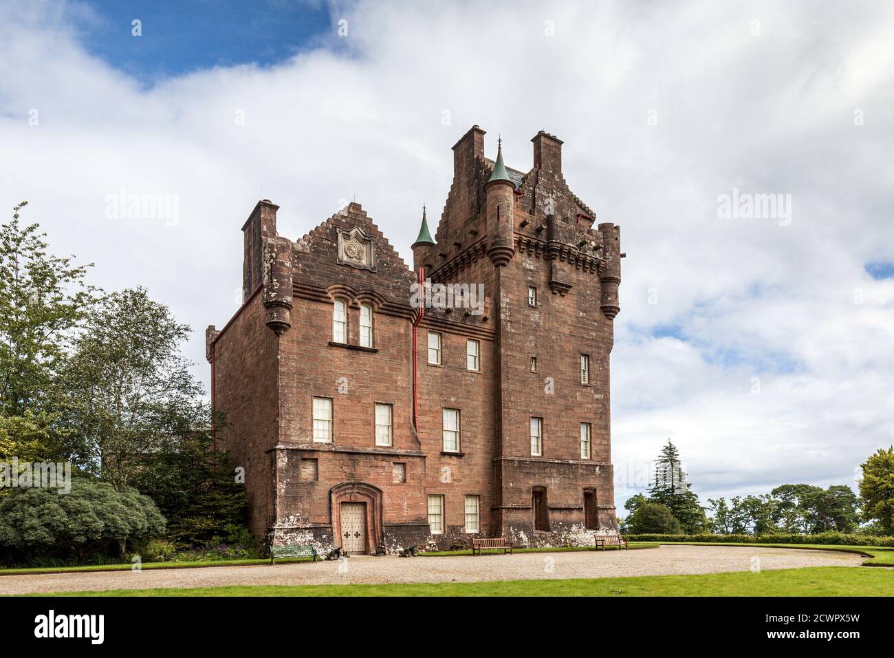 Brodick Castle stands in an elevated position at the foot of Goatfell mountain on the Isle of Arran, Scotland. Stock Photo