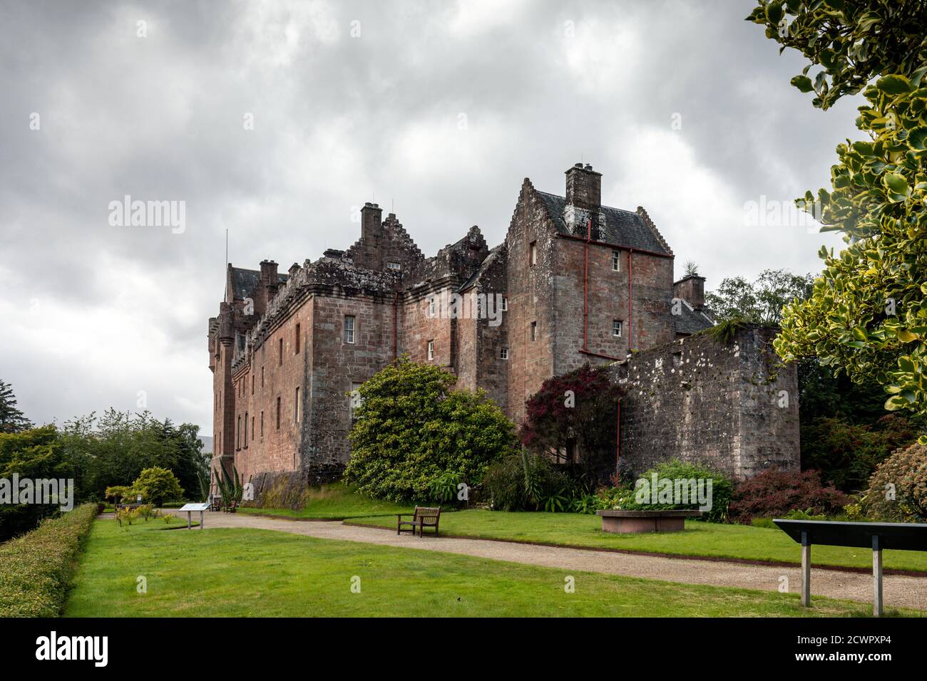 Brodick Castle stands in an elevated position at the foot of Goatfell mountain on the island of Arran, Scotland. Stock Photo