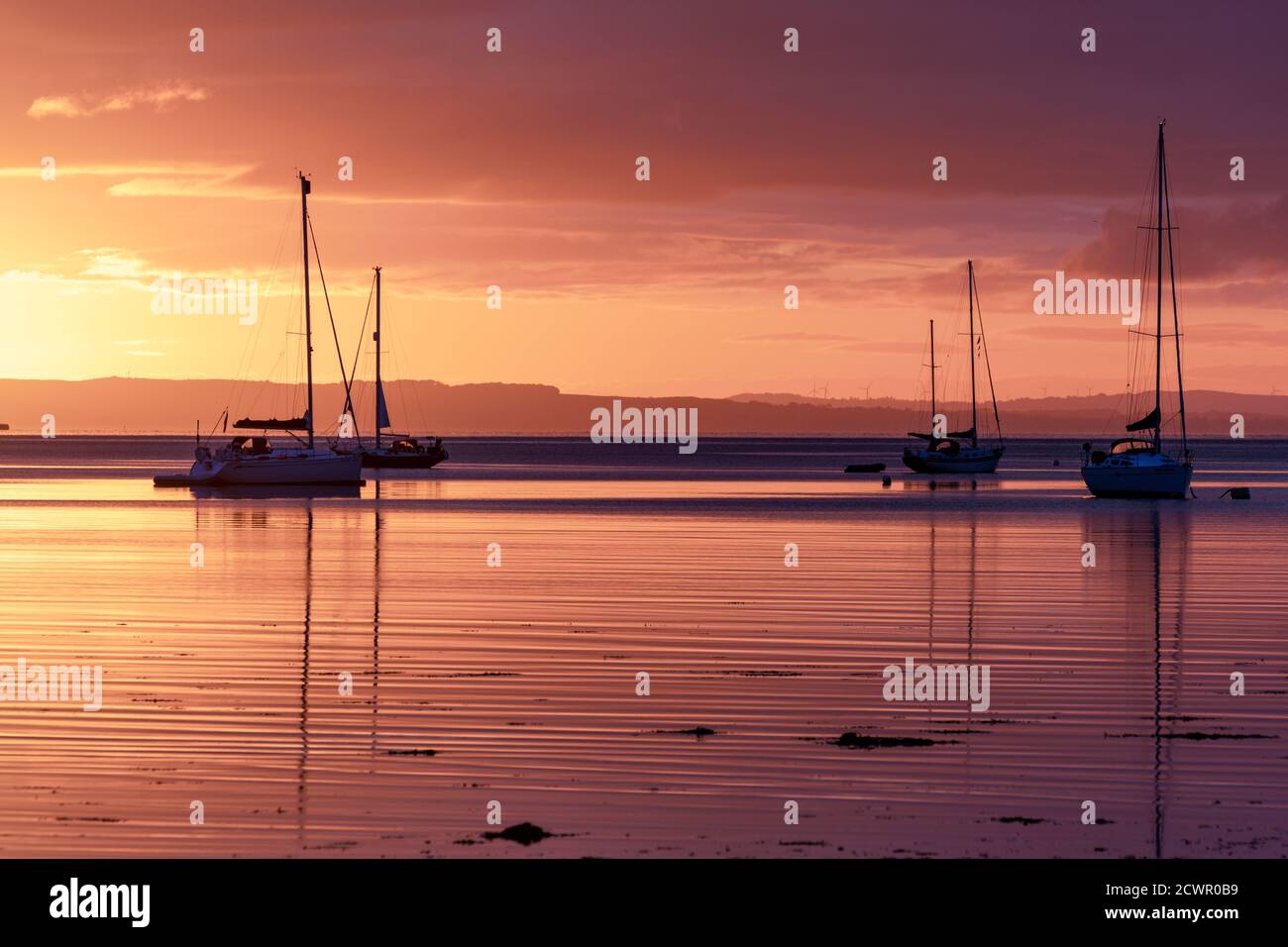 Beautiful sunrise at Lamlash Bay, Isle of Arran, in the Firth of Clyde, Scotland, Uk Stock Photo