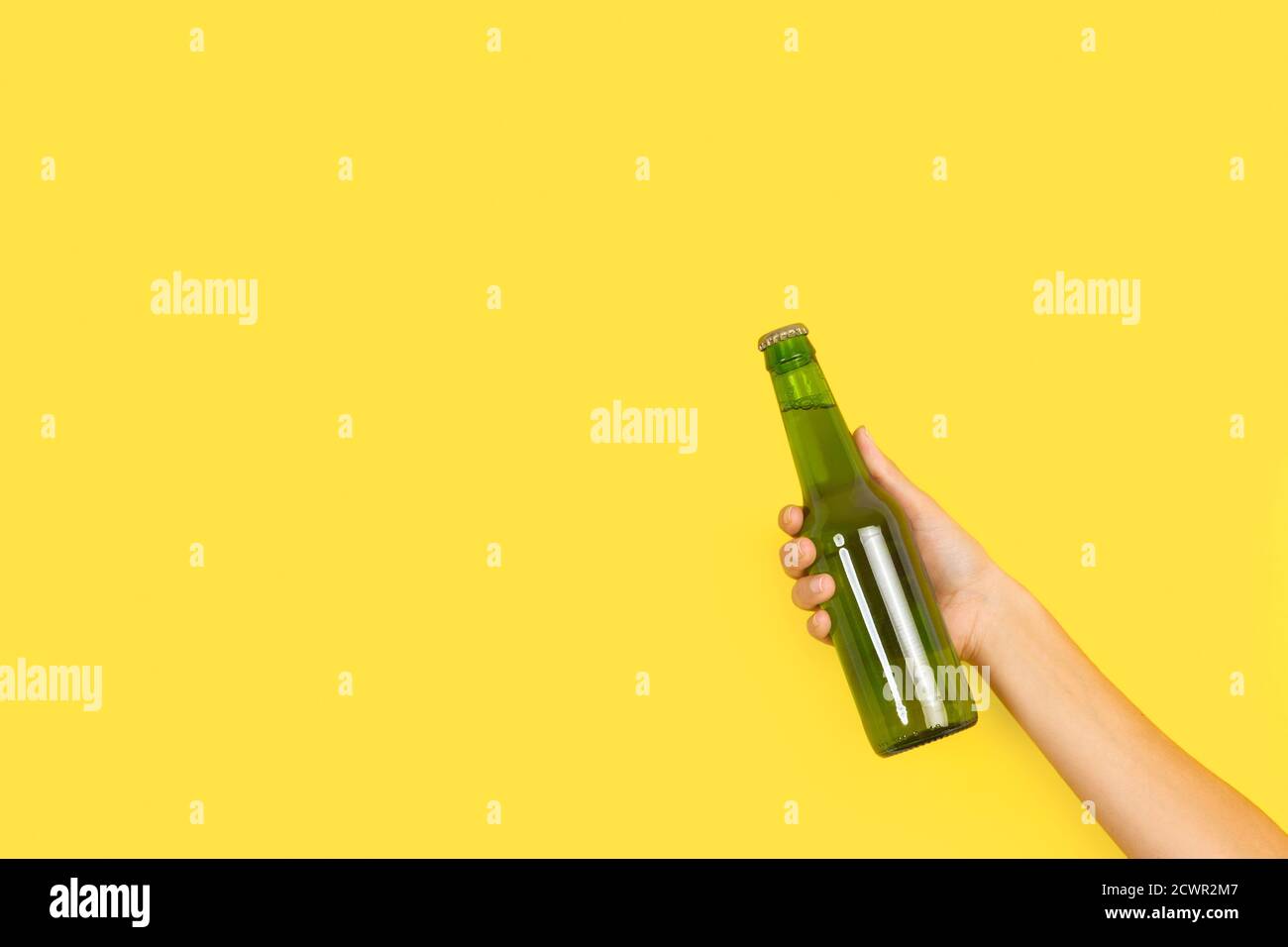 Woman hand holding bottle beer hires stock photography and images Alamy