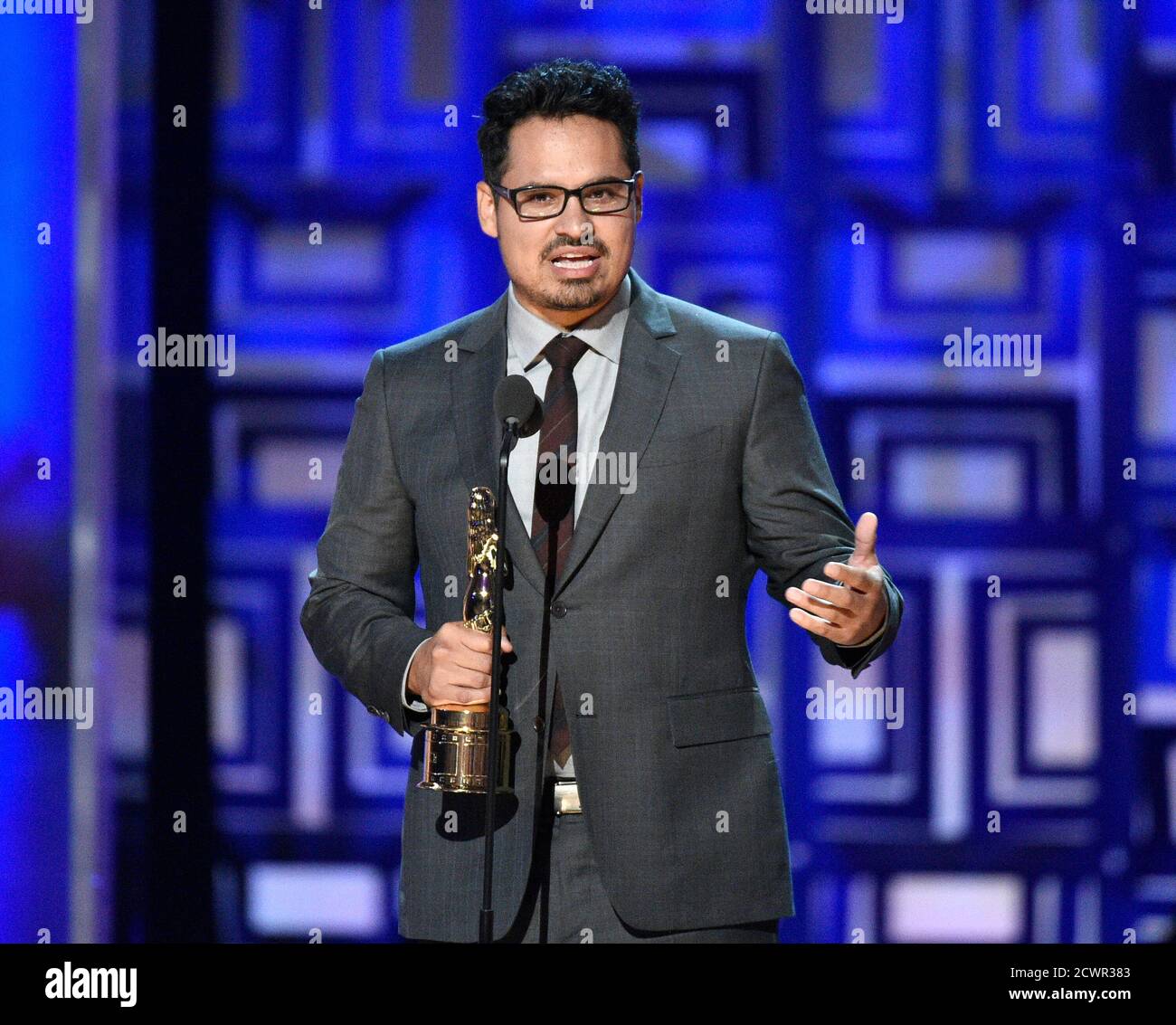 Michael Pena accepts the award for Special Achievement in Film for the cast  of "Cesar Chavez" during the 2014 NCLR ALMA Awards at the Pasadena Civic  Auditorium in Pasadena, California October 10,